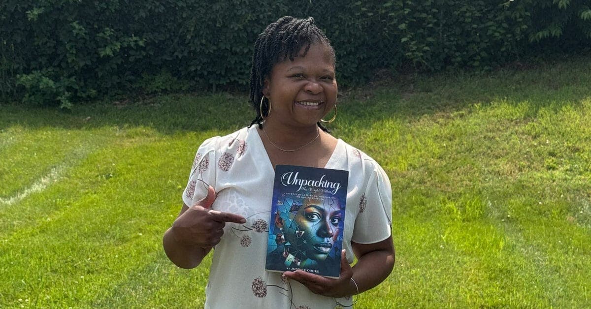 jonnice-cooke-holding-her-book